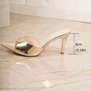 Detailed side view of elegant golden high-heeled mule featuring a slim 8cm heel height