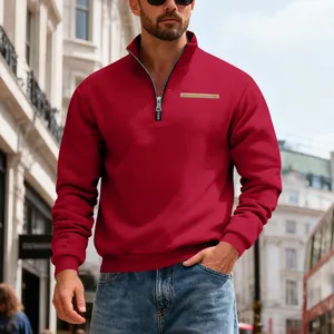 Close-up of a red American heavyweight half-zip stand collar sweatshirt on a model