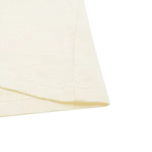 Close-up of vintage slub cotton t-shirt hem showing high-quality double stitching
