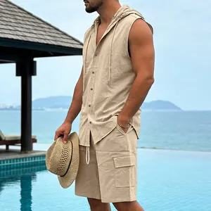 Detailed view of men's beige linen hooded sleeveless shirt and cargo shorts vacation beach set