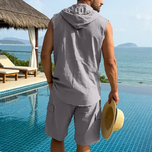 Rear view of men's grey linen hooded sleeveless shirt and cargo shorts vacation set