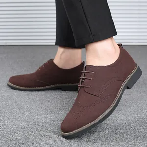 Detailed side view of men's brown suede Brogue shoes with classic wingtip perforations