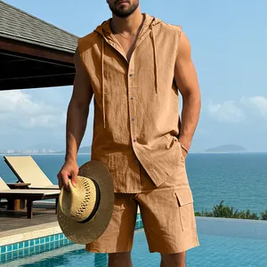 Detail of men's camel linen hooded sleeveless shirt and matching cargo shorts set for beach.