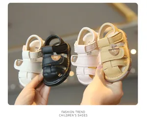 Detailed view of cute soft-soled baby sandals in four colors held by hand for display.