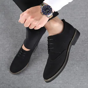 Stylish black suede Brogue dress shoes for men with elegant wingtip perforation details