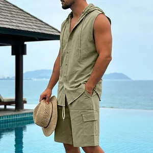 Close-up of men's olive green linen sleeveless hoodie and cargo shorts beach set