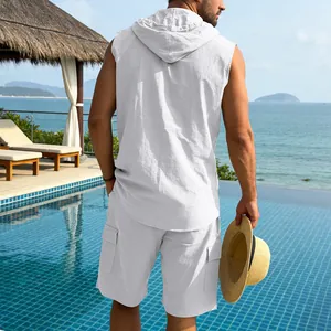 Back view of men's white linen sleeveless hooded shirt and shorts at poolside