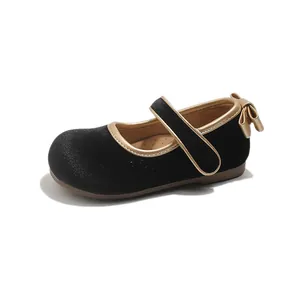 Eleganti scarpe da principessa nere e oro per bambine con fiocco e cinturino a strappo