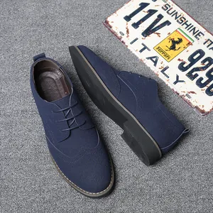 Detailed top view of navy blue suede Brogue shoes showing fine stitching and classic design