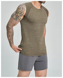 Detailed view of breathable seamless cationic fabric on men's olive green sports vest.
