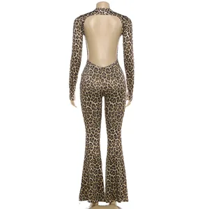 Detailed back view of leopard print long sleeve jumpsuit with a sexy open back.