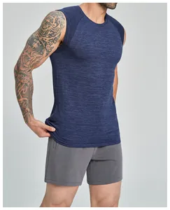 Close-up of men's quick-dry sports tank top showing seamless fit and heathered blue fabric.