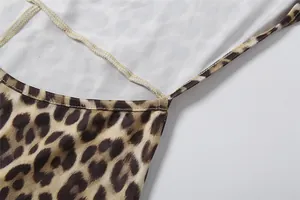 Close-up view of the fine stitching detail on a leopard print backless long sleeve jumpsuit.