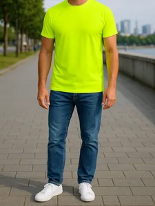 Male model wearing a neon yellow moisture-wicking short sleeve T-shirt and blue jeans outdoors
