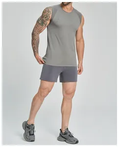 Man in gray cationic seamless quick-dry tank top and shorts for fitness training