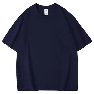 Detail view of navy blue crew neck short sleeve t-shirt laid flat on white background