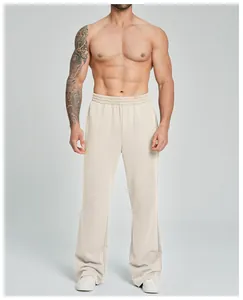 Detailansicht der locker geschnittenen Herren-Sport-Schlaghose in Beige, ideal für Fitness