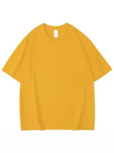 Plain yellow oversized cotton T-shirt for men with a classic round neck design.
