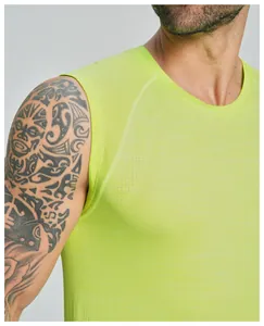 Close-up detail of lime green cationic seamless men's sports tank top with mesh
