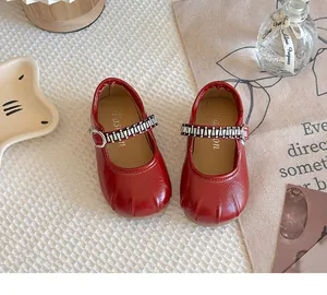 French style red girls Mary Jane leather shoes featuring elegant buckle strap details