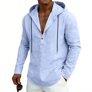 Close-up detail of a men's light blue casual linen hoodie with black drawstring