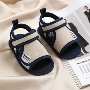 Navy blue and beige cotton baby sandals with Velcro straps for summer pre-walking
