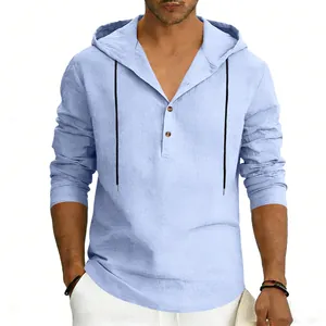Detailed view of a light blue long sleeve linen hooded Henley shirt with black drawstrings