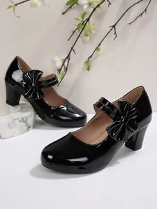 Eleganti scarpe Mary Jane in vernice nera con fiocco grande e dettaglio tacco largo