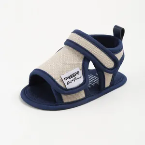 Breathable navy and beige cotton baby sandals with adjustable velcro straps for toddlers