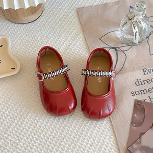 Red French-style Mary Jane leather shoes for girls with sparkling rhinestone straps.