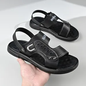 Sandalias de playa negras para hombre versátiles con suela blanda antideslizante.