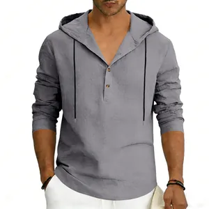 Macro view of grey men's breathable linen Henley hoodie with buttoned placket and hood