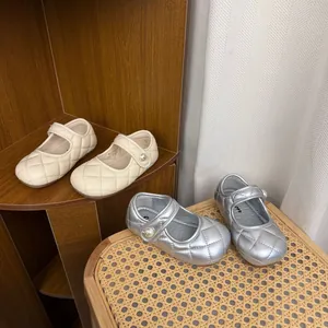Quilted children Mary Janes in cream and silver with pearl detail