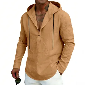 Detail of camel linen hooded Henley shirt with button placket and breathable texture