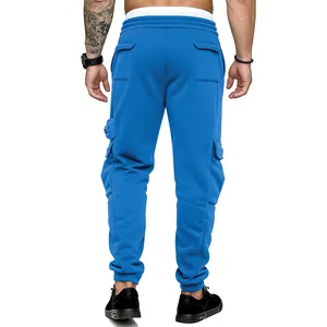 Back view of men's blue cargo jogger pants showing multi-pocket design and ribbed cuffs