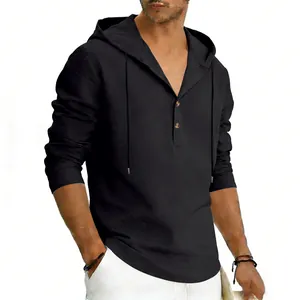 Detailed view of men's black breathable linen Henley hoodie with hood and buttons