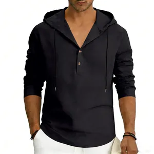 Close-up of black men's linen hooded Henley shirt showing fabric texture and buttons