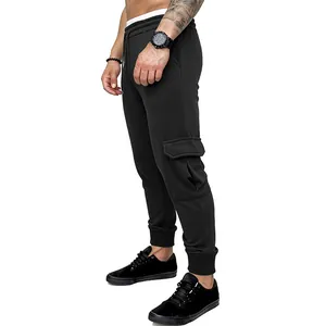 Side view profile of men's black cargo joggers featuring a functional flap pocket detail