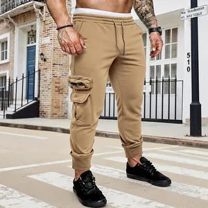 Detailed view of men's khaki cargo joggers featuring multi-pockets and drawstring