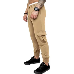 Side view of khaki men's cargo jogger pants featuring drawstring and utility pockets