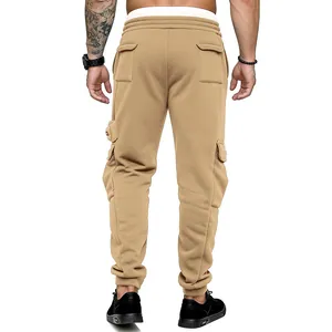 Rear view of khaki men's cargo sweatpants with flap pockets and ribbed cuffs.