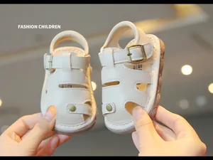 Cream-colored baby summer sandals with soft non-slip soles and hollow-out design