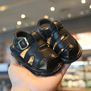 Black baby summer sandals with soft non-slip sole and hollow-out design for toddlers