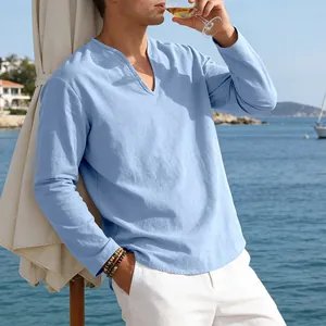 Stylish light blue linen blend V-neck long sleeve shirt for men in beach setting