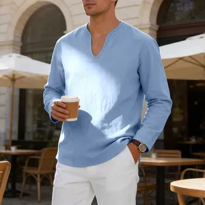 Detailed view of a light blue linen-blend V-neck long sleeve shirt for men outdoors