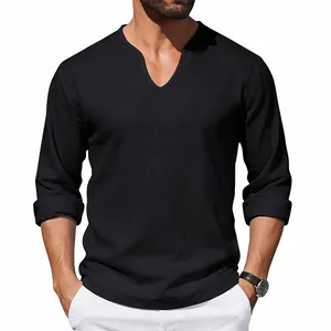 Close-up detail of men's loose black linen T-shirt featuring a casual V-neck design