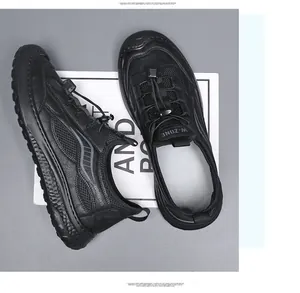 Macro detail of black breathable mesh outdoor casual shoes with speed lacing