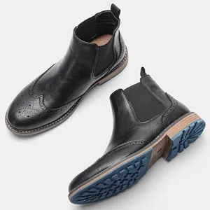 Klassische schwarze Chelsea-Boots für Herren aus Leder mit blauer profilierter Gummisohle