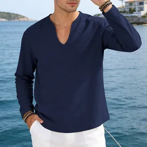 Close-up detail of navy blue linen V-neck long sleeve shirt worn by a male model