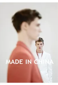 Artistic lifestyle detail of men's autumn fashion featuring minimalist white jacket